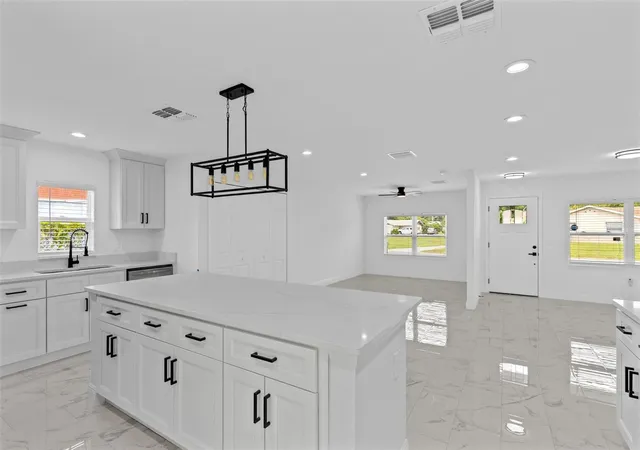 Photo 4 of Single family home for sale at 4410 Chateau Rd, Orlando, FL 32808 | MLS# O6446759 | Listing updated on 2026-10-03