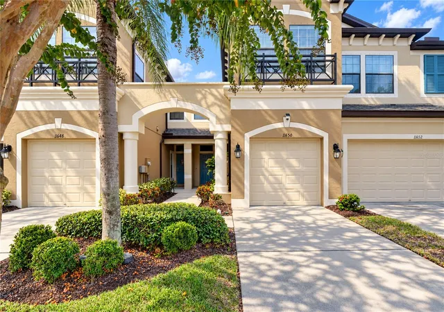 Photo 2 of Townhouse for sale at 11650 Crowned Sparrow Ln, Tampa, FL 33626 | MLS# TB8554339 | Listing updated on 2026-10-04
