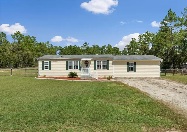 Photo 2 of Manufactured home for sale at 13265 Sw 67th Lane, Ocala, FL 34481 | MLS# OM733349 | Listing updated on 2026-10-03