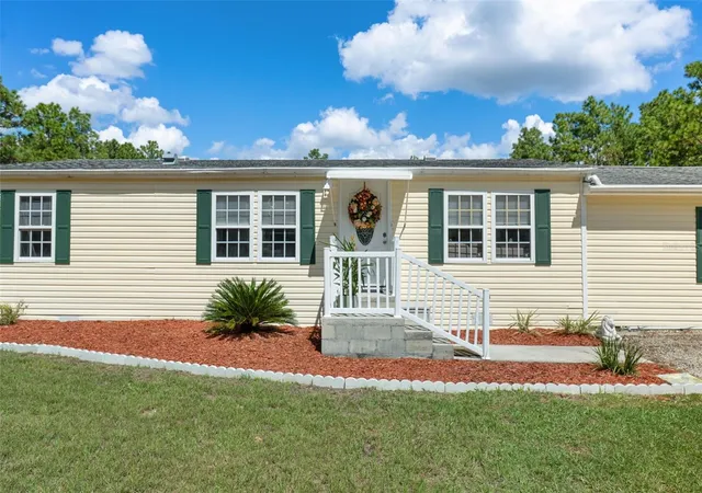Photo 3 of Manufactured home for sale at 13265 SW 67th Lane, Ocala, FL 34481 | MLS# OM733349 | Listing updated on 2026-10-03