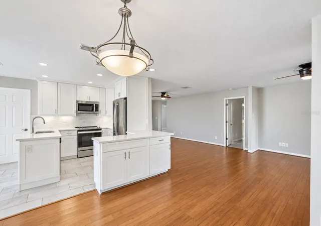 Photo 3 of Single family home for sale at 913 Sutton Pl, Palm Harbor, FL 34684 | MLS# TB8554386 | Listing updated on 2026-10-05