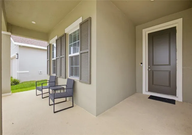Photo 3 of Single family home for sale at 8324 Greenway Ave, Wesley Chapel, FL 33544 | MLS# TB8554403 | Listing updated on 2026-10-06