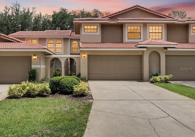 Photo 1 of Townhouse for sale at 8235 Ambrose Cvs Way, Orlando, FL 32819 | MLS# O6446808 | Listing updated on 2026-10-23