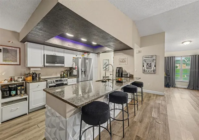 Photo 3 of Single family home for sale at 12222 Legend St, Spring Hill, FL 34609 | MLS# TB8554413 | Listing updated on 2026-10-03