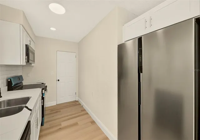 Photo 4 of Single family home for sale at 214 45th Avenue NE, Saint Petersburg, FL 33703 | MLS# TB8554419 | Listing updated on 2026-10-03