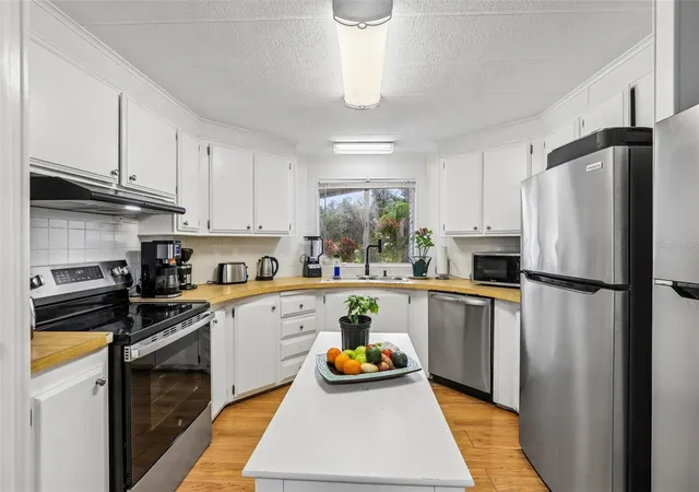 Photo 3 of Manufactured home for sale at 8807 Sheldon W Dr, Tampa, FL 33626 | MLS# TB8554423 | Listing updated on 2026-10-10