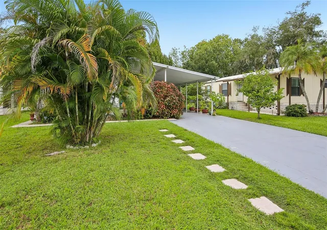 Photo 1 of Manufactured home for sale at 8807 Sheldon W Dr, Tampa, FL 33626 | MLS# TB8554423 | Listing updated on 2026-10-10
