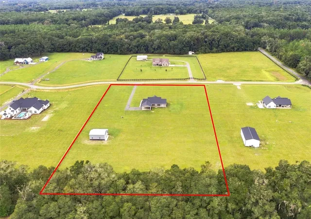 Photo 3 of Single family home for sale at 20875 NW 207th Terrace, High Springs, FL 32643 | MLS# GC543932 | Listing updated on 2026-10-09