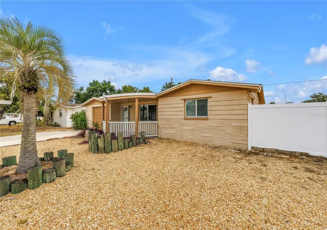 Photo 1 of Single family home for sale at 1516 Derrick St, Holiday, FL 34690 | MLS# TB8554444 | Listing updated on 2026-10-07