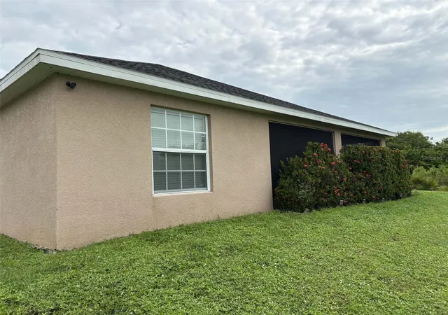 Photo 2 of Single family home for sale at 3703 4th Street Sw, Lehigh Acres, FL 33976 | MLS# TB8554447 | Listing updated on 2026-10-05