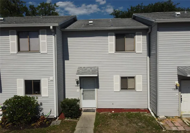 Photo 1 of Townhouse for sale at 1304 Deer Springs Rd, Port Orange, FL 32129 | MLS# O6446852 | Listing updated on 2026-10-04