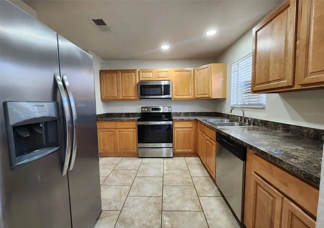 Photo 3 of Townhouse for sale at 1304 Deer Springs Rd, Port Orange, FL 32129 | MLS# O6446852 | Listing updated on 2026-10-04