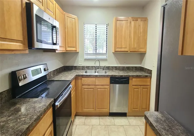 Photo 4 of Townhouse for sale at 1304 Deer Springs Rd, Port Orange, FL 32129 | MLS# O6446852 | Listing updated on 2026-10-04