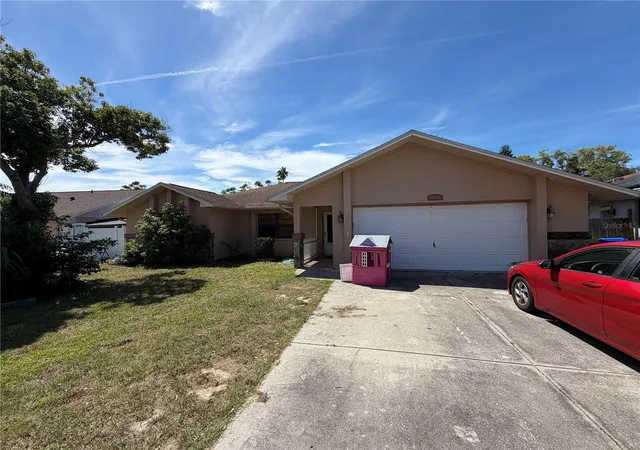 Photo 1 of Single family home for sale at 11433 Brown Bear Ln, Port Richey, FL 34668 | MLS# W7890039 | Listing updated on 2026-10-04