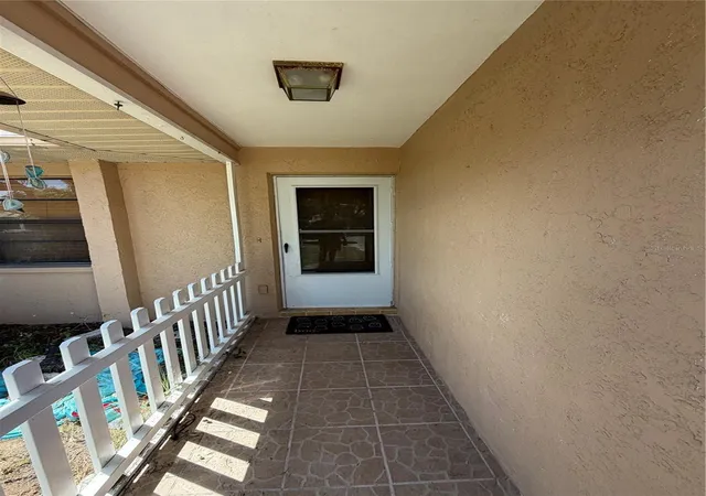 Photo 3 of Single family home for sale at 11433 Brown Bear Ln, Port Richey, FL 34668 | MLS# W7890039 | Listing updated on 2026-10-04