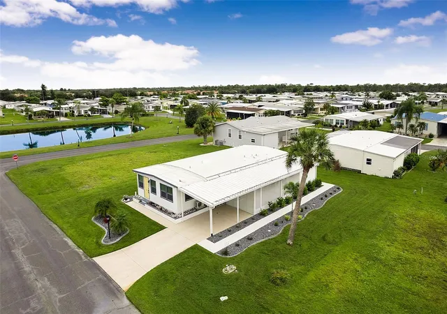 Photo 3 of Manufactured home for sale at 403 Vivar, North Port, FL 34287 | MLS# TB8554473 | Listing updated on 2026-10-07