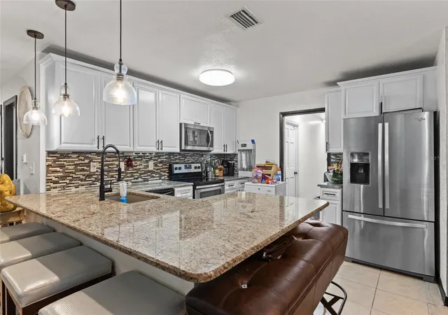 Photo 3 of Single family home for sale at 1319 Quintuplet Dr, Casselberry, FL 32707 | MLS# OM733377 | Listing updated on 2026-10-08