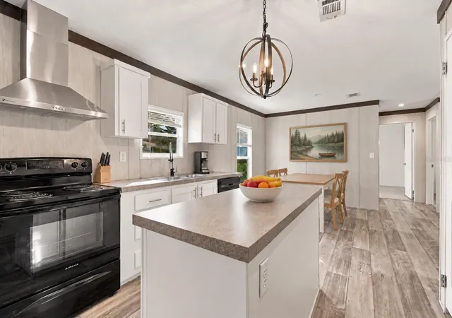 Photo 4 of Manufactured home for sale at 14456 Geneva Dr, Odessa, FL 33556 | MLS# TB8554488 | Listing updated on 2026-10-07