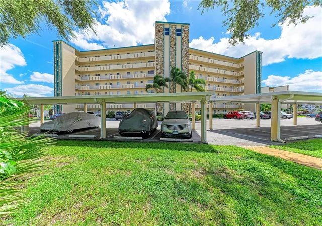 Photo 1 of Condo for sale at 4040 Ironwood Cir #702F, Bradenton, FL 34209 | MLS# A4708314 | Listing updated on 2026-10-08