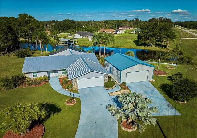 Single family home for sale at 6449 Avocado Dr, INDIAN LAKE ESTATES, FL 33855 | MLS# TB8554508