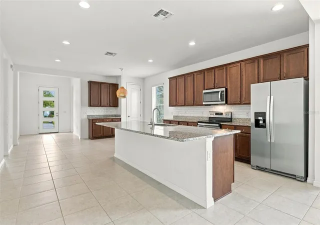 Photo 3 of Single family home for sale at 8518 Nemours Pkwy, Orlando, FL 32827 | MLS# O6446919 | Listing updated on 2026-10-08
