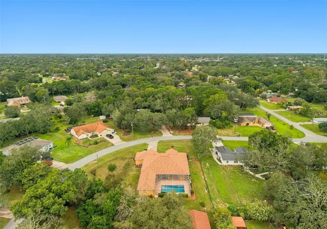 Photo 2 of Single family home for sale at 1486 Alameda Dr, Spring Hill, FL 34609 | MLS# W7890046 | Listing updated on 2026-10-10