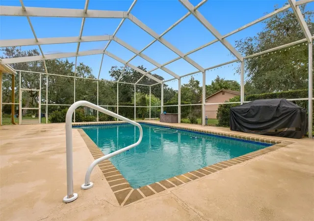 Photo 3 of Single family home for sale at 1486 Alameda Dr, Spring Hill, FL 34609 | MLS# W7890046 | Listing updated on 2026-10-10