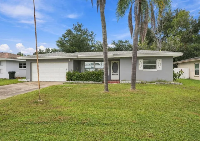 Photo 1 of Single family home for sale at 1354 S Lotus Dr, Dunedin, FL 34698 | MLS# W7890048 | Listing updated on 2026-10-04