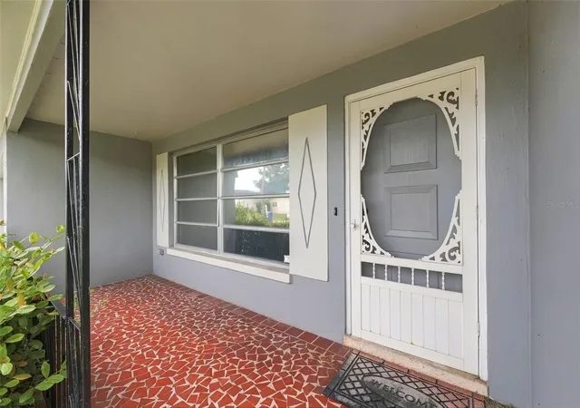 Photo 2 of Single family home for sale at 1354 S Lotus Dr, Dunedin, FL 34698 | MLS# W7890048 | Listing updated on 2026-10-04