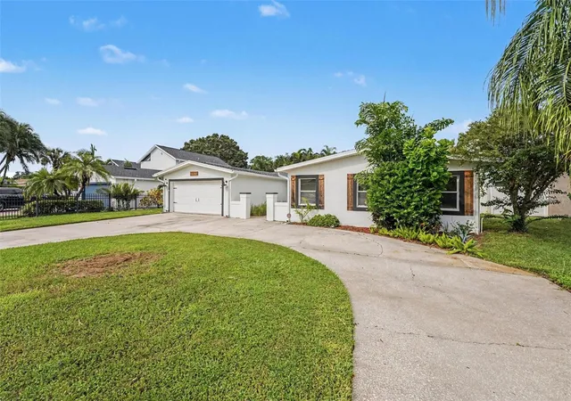 Photo 2 of Single family home for sale at 3936 E Eden Roc Cir #1, Tampa, FL 33634 | MLS# TB8554548 | Listing updated on 2026-10-03