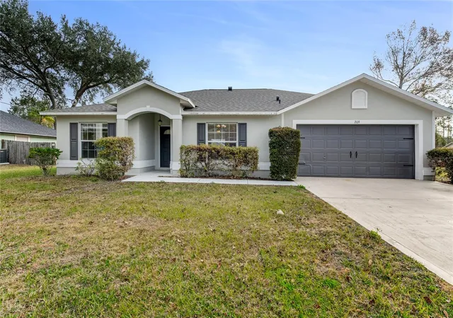 Photo 1 of Single family home for sale at 209 Parkview Dr, Palm Coast, FL 32164 | MLS# FC321882 | Listing updated on 2026-10-03