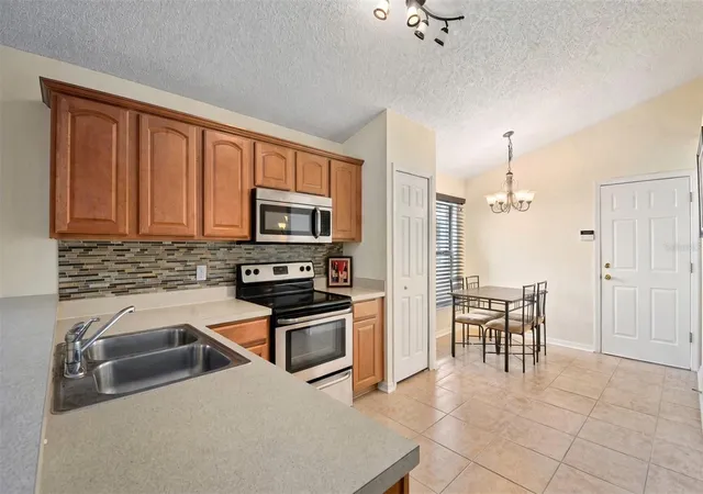 Photo 2 of Single family home for sale at 4808 Northern Dancer Way, Orlando, FL 32826 | MLS# O6446973 | Listing updated on 2026-10-03