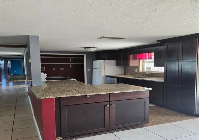 Photo 3 of Single family home for sale at 1512 Russell Ave, Sarasota, FL 34232 | MLS# O6446977 | Listing updated on 2026-10-06