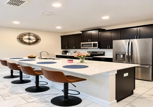 Photo 4 of Townhouse for sale at 8953 Stinger Dr, Davenport, FL 33896 | MLS# A4708369 | Listing updated on 2026-10-08