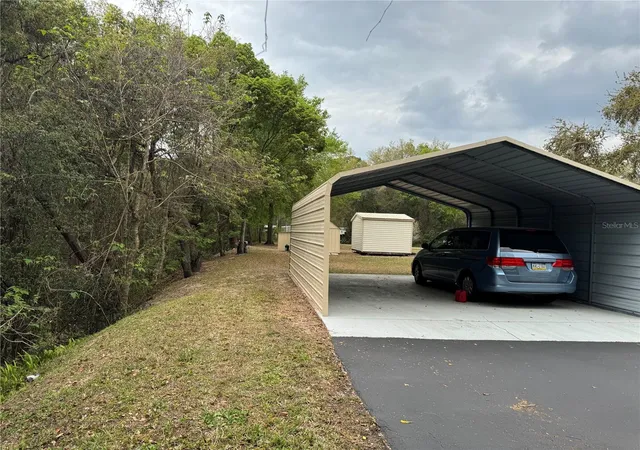 Photo 2 of Manufactured home for sale at 18600 SE 17th Street, Silver Springs, FL 34488 | MLS# OM733401 | Listing updated on 2026-10-05