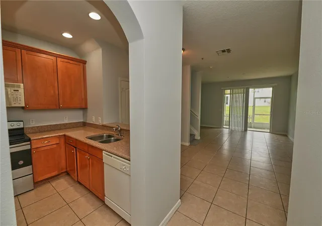 Photo 3 of Townhouse for sale at 5848 Strada Capri Way, Orlando, FL 32835 | MLS# O6446986 | Listing updated on 2026-10-04