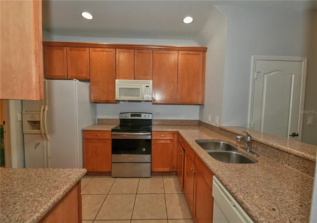 Photo 3 of Townhouse for sale at 5848 Strada Capri Way, Orlando, FL 32835 | MLS# O6446986 | Listing updated on 2026-10-04
