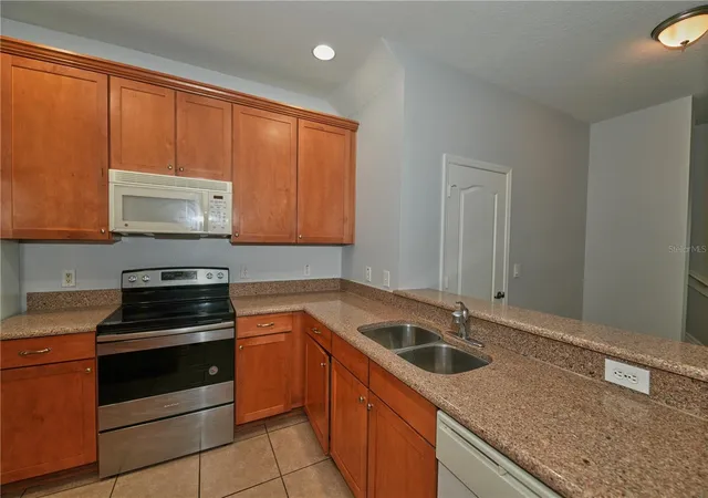 Photo 4 of Townhouse for sale at 5848 Strada Capri Way, Orlando, FL 32835 | MLS# O6446986 | Listing updated on 2026-10-04
