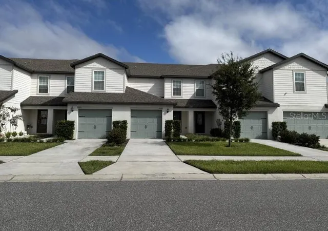 Photo 1 of Townhouse for sale at 1695 Wynford Cir, Tavares, FL 32778 | MLS# O6446991 | Listing updated on 2026-10-03