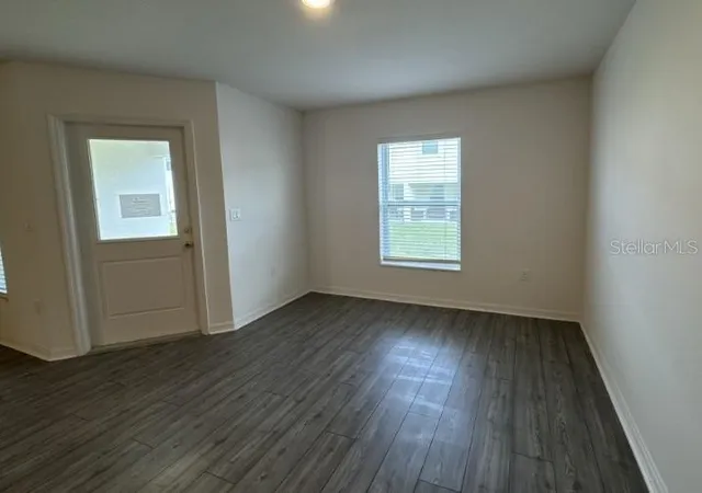 Photo 3 of Townhouse for sale at 1695 Wynford Cir, Tavares, FL 32778 | MLS# O6446991 | Listing updated on 2026-10-03