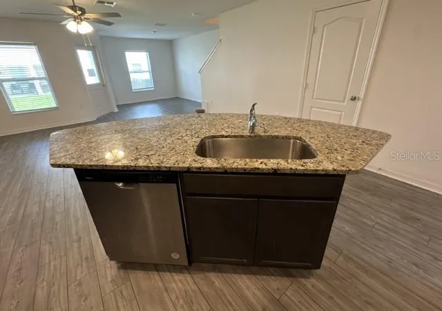 Photo 3 of Townhouse for sale at 1695 Wynford Cir, Tavares, FL 32778 | MLS# O6446991 | Listing updated on 2026-10-03