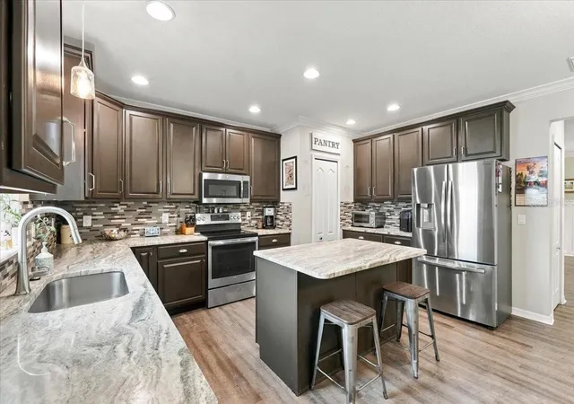 Photo 2 of Single family home for sale at 724 Pataches Pl, Groveland, FL 34736 | MLS# S5158816 | Listing updated on 2026-10-07