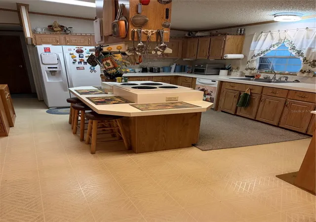 Photo 4 of Manufactured home for sale at 7650 SW 10th Street, Ocala, FL 34474 | MLS# OM733402 | Listing updated on 2026-10-04
