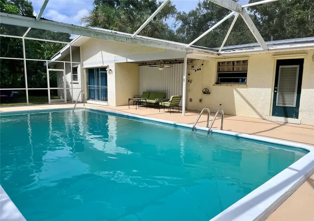 Photo 3 of Single family home for sale at 22215 Oneida Ave, Port Charlotte, FL 33952 | MLS# A4708382 | Listing updated on 2026-10-07