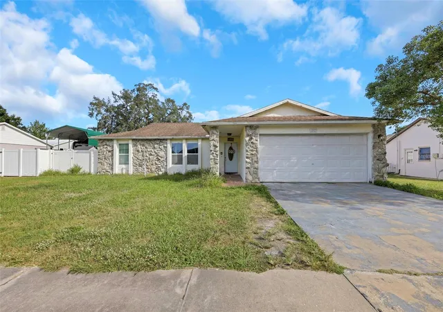 Photo 1 of Single family home for sale at 12023 Mahogany Dr, Hudson, FL 34669 | MLS# O6447011 | Listing updated on 2026-10-05
