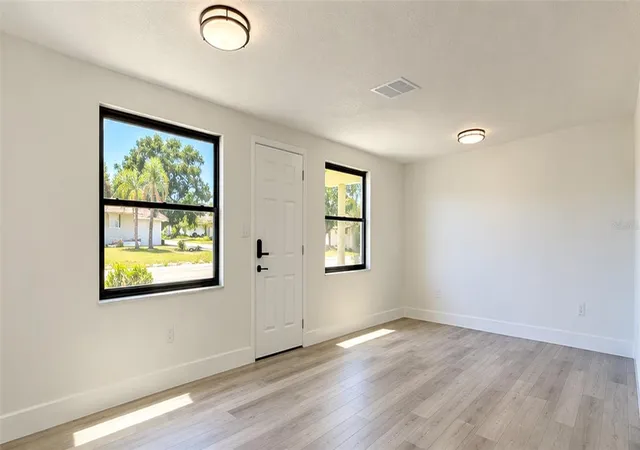 Photo 3 of Single family home for sale at 3708 Holiday Lake Dr, Holiday, FL 34691 | MLS# O6447031 | Listing updated on 2026-10-07