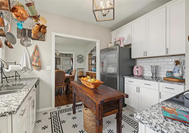 Photo 3 of Single family home for sale at 809 E Flora St, Tampa, FL 33604 | MLS# TB8554632 | Listing updated on 2026-10-09