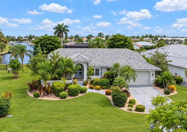 Single family home for sale at 1018 Conecta Dr, PUNTA GORDA, FL 33950 | MLS# C7531529