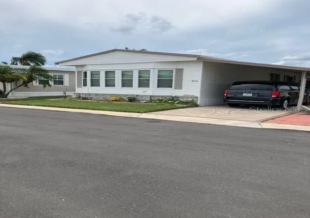 Photo 1 of Manufactured home for sale at 3211 Southport Dr, Holiday, FL 34690 | MLS# TB8554656 | Listing updated on 2026-10-04