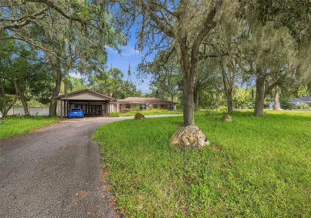 Photo 2 of Single family home for sale at 15499 Oakcrest Cir, Brooksville, FL 34604 | MLS# W7890059 | Listing updated on 2026-10-07